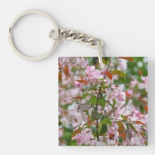Delicate branch with flowers apple tree key ring