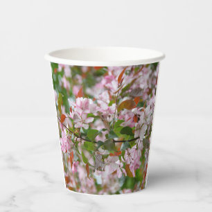 Delicate branch with flowers apple tree paper cups