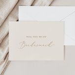 Delicate Gold and Cream Bridesmaid Proposal Card<br><div class="desc">This delicate gold and cream bridesmaid proposal card is perfect for a modern wedding. The romantic minimalist design features lovely and elegant champagne golden yellow typography on an ivory cream background with a clean and simple look. Customise the card with the name of the bride and the bridesmaid. Personalise the...</div>