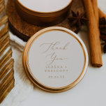 Delicate Gold and Cream Thank You Wedding Favour Classic Round Sticker<br><div class="desc">These delicate gold and cream thank you wedding favour stickers are perfect for a modern wedding reception. The romantic minimalist design features lovely and elegant champagne golden yellow typography on an ivory cream background with a clean and simple look. Personalise the sticker labels with your names, the event (if applicable),...</div>