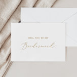 Delicate Gold Calligraphy Bridesmaid Proposal Card<br><div class="desc">This delicate gold calligraphy bridesmaid proposal card is perfect for a modern wedding. The romantic minimalist design features lovely and elegant champagne golden yellow typography on a white background with a clean and simple look. Customise the card with the name of the bride and the bridesmaid. Personalise the back of...</div>