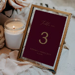 Delicate Gold Calligraphy | Burgundy Table No. Number<br><div class="desc">This delicate gold calligraphy burgundy table no. table number is perfect for a modern wedding. The romantic minimalist design features lovely and elegant champagne golden yellow typography on a burgundy red background with a clean and simple look. The card prints on the front and back (double-sided). Items are printed exactly...</div>