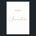 Delicate Gold Calligraphy Table Seventeen Table Number<br><div class="desc">This delicate gold calligraphy table seventeen table number is perfect for a modern wedding. The romantic minimalist design features lovely and elegant champagne golden yellow typography on a white background with a clean and simple look. The card prints on the front and back (double-sided). Other table numbers in the collection...</div>