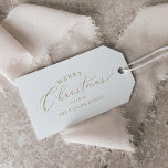 Delicate Gold Merry Christmas Family Holiday Gift Tags<br><div class="desc">These delicate gold Merry Christmas family holiday gift tags are perfect for a modern holiday present. The romantic minimalist design features lovely and elegant champagne golden yellow typography on a white background with a clean and simple look. Personalise them with your name.</div>