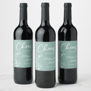 Delicate orchid cheers to the wedding green custom wine label