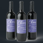 Delicate orchid cheers to wedding purple custom wine label<br><div class="desc">Elegant customisable wine labels for your wedding reception, featuring beautiful and delicate white orchids line drawing on one side, over a romantic contemporary periwinkle purple background, and the wording "Cheers to the wedding of" in white fonts. Easily edit the template fields to add the bride and groom names in a...</div>