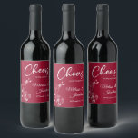 Delicate orchids cheers to the wedding red custom wine label<br><div class="desc">Elegant customisable wine labels for your wedding reception, featuring beautiful and delicate white orchids line drawing on one side, over a classic crimson red background, and the wording "Cheers to the wedding of" in white fonts. Easily edit the template fields to add the bride and groom names in a classy...</div>