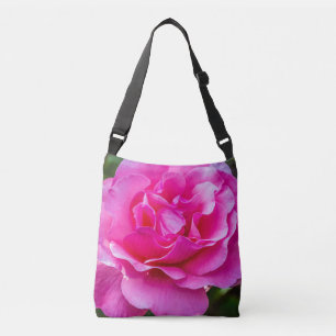 Delicate pink rose. crossbody bag