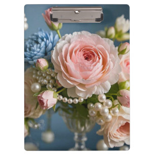 Delicate pink rose with pearl in vase clipboard