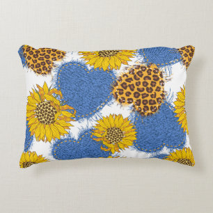 Denim hearts made of fabric with torn edges and le decorative cushion