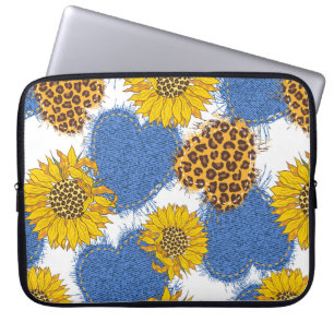 Denim hearts made of fabric with torn edges and le laptop sleeve
