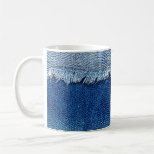 Denim jeans background. Ripped denim fabric with b Coffee Mug