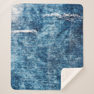 Denim texture.Blue jeans with threads and holes fo Sherpa Blanket