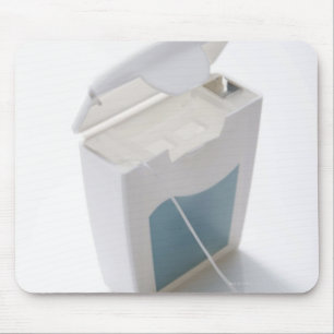Dental floss mouse pad