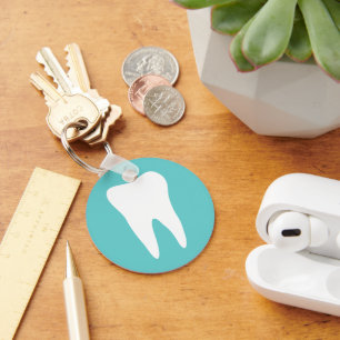 Dentistry keychain with white tooth logo