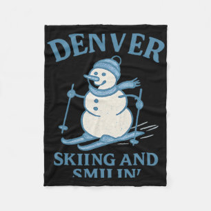 Denver Colorado Skiing And Smilin Snowman  Fleece Blanket