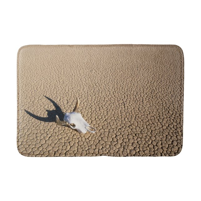 Deserts | Cow Skull on the Desert Ground Bath Mat (Front)