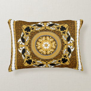 Design of silk scarf with animal print and golden decorative cushion