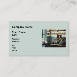 Desk With Bottles of Chemicals Business Card