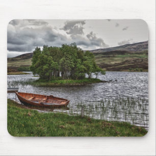 Desolated boat landscape mouse pad
