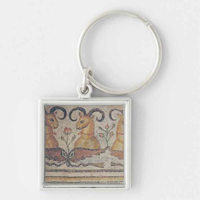 Detail from the border of a pavement key ring (Front)