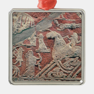 Detail of figures illustrating a saga metal ornament