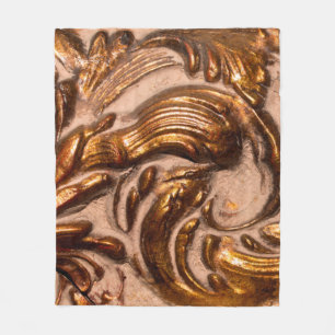 detail of ornamental picture frame, bronze colour. fleece blanket