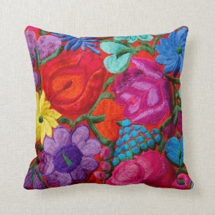 Detail of traditional embroidery floral textile cushion