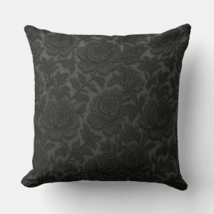 Detailed floral income in black desing cushion