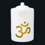 Devanagari om - White<br><div class="desc">Featuring intricate detailing around the Om symbol, each piece is thoughtfully designed to capture attention while radiating positive energy. The soft golden colour adds a touch of sophistication that complements any outfit or accessory.</div>