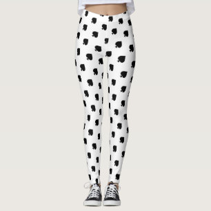diagonal black spades pattern on white leggings