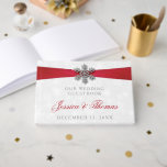 Diamante Snowflake & Red Ribbon Winter Wedding Guest Book<br><div class="desc">The diamante snowflake & red ribbon wedding collection is perfect for any couple planning a romantic winter wedding celebration. The design features a light silvery grey and white snowflake textured background with a diamante snowflake on top of a silky looking ribbon. The wording incorporates the same silvery grey and red...</div>