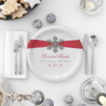 Diamante Snowflake & Red Ribbon Winter Wedding Paper Plate<br><div class="desc">The diamante snowflake & red ribbon wedding collection is perfect for any couple planning a romantic winter wedding celebration. The design features a light silvery grey and white snowflake textured background with a diamante snowflake on top of a silky looking ribbon. The wording incorporates the same silvery grey and red...</div>