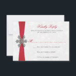 Diamante Snowflake & Red Ribbon Winter Wedding RSVP Card<br><div class="desc">The diamante snowflake & red ribbon wedding collection is perfect for any couple planning a romantic winter wedding celebration. The design features a light silvery grey and white snowflake textured background with a diamante snowflake on top of a silky looking ribbon. The wording incorporates the same silvery grey and red...</div>