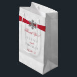 Diamante Snowflake & Red Ribbon Winter Wedding Small Gift Bag<br><div class="desc">The diamante snowflake & red ribbon wedding collection is perfect for any couple planning a romantic winter wedding celebration. The design features a light silvery grey and white snowflake textured background with a diamante snowflake on top of a silky looking ribbon. The wording incorporates the same silvery grey and red...</div>