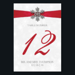 Diamante Snowflake & Red Ribbon Winter Wedding Table Number<br><div class="desc">The diamante snowflake & red ribbon wedding collection is perfect for any couple planning a romantic winter wedding celebration. The design features a light silvery grey and white snowflake textured background with a diamante snowflake on top of a silky looking ribbon. The wording incorporates the same silvery grey and red...</div>