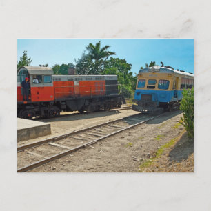 Diesellocomotive and railcar meeting postcard