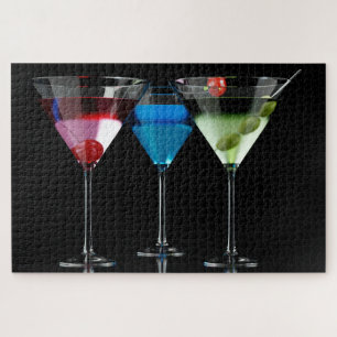 Different cocktails in martini glasses on black jigsaw puzzle