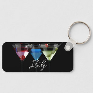 Different cocktails in martini glasses on black key ring