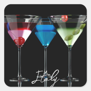 Different cocktails in martini glasses on black square sticker