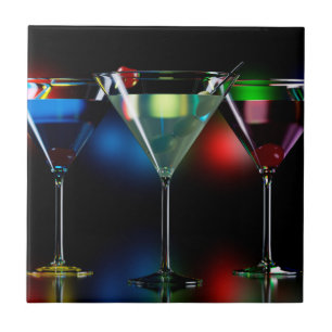 Different cocktails in martini glasses with lights ceramic tile
