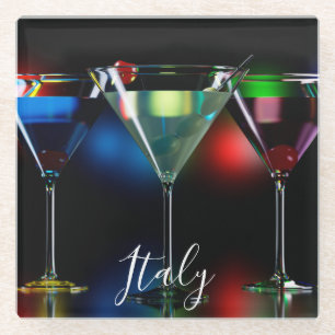 Different cocktails in martini glasses with lights glass coaster