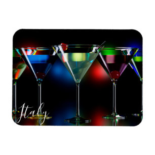 Different cocktails in martini glasses with lights magnet
