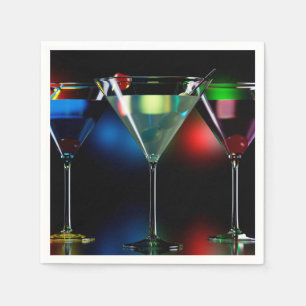 Different cocktails in martini glasses with lights napkin