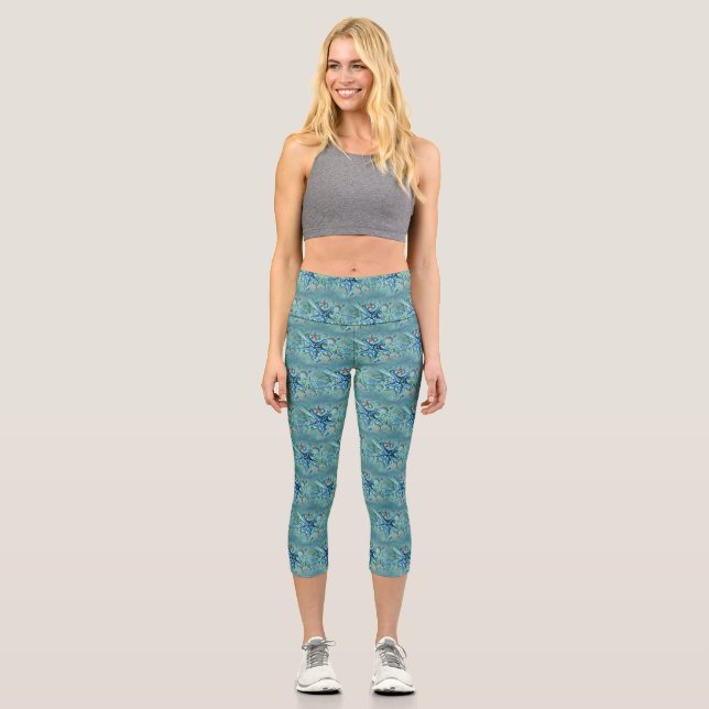 Different types tropical seashells blue painting capri leggings (Front)