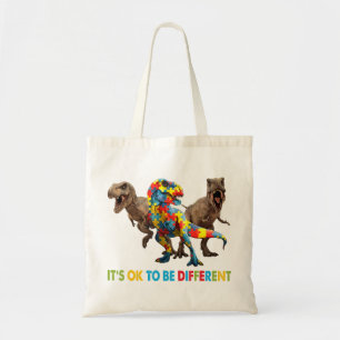Dinosaur Autism Awareness design features a dinosa Tote Bag