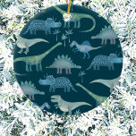 Dinosaur Cute Ceramic Ornament<br><div class="desc">Lots of blue dinosaurs,  Tyrannosaurus rex,  Spinosaurus,  Stegosaurus,  Diplodocus and Triceratops on a teal green background. Perfect for paleontologists.  Original art by Nic Squirrell.</div>