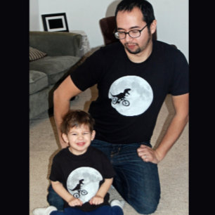 Dinosaur on a Bike In Sky With Moon T-Shirt