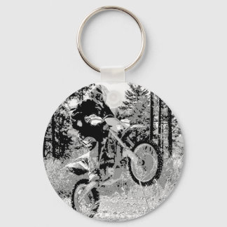 Dirt bike wheeling in the wood key ring