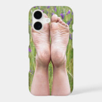 dirty bare feet in wildflowers